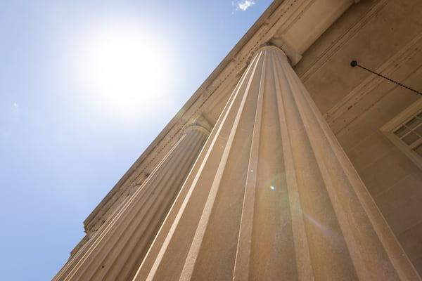 A view of the columns of Gorgas Library from the ground